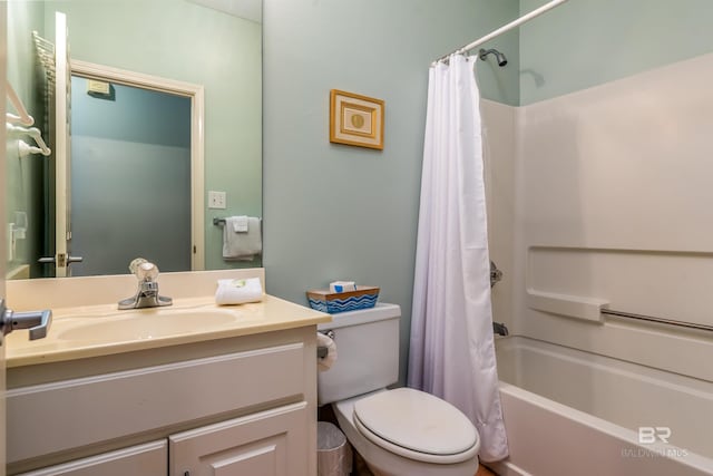 full bathroom featuring shower / bathtub combination with curtain, toilet, and vanity