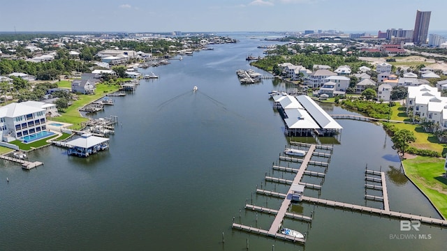 birds eye view of property featuring a water view