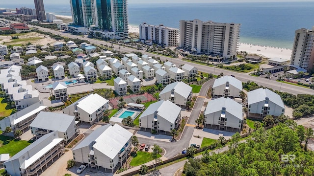 aerial view with a city view and a water view