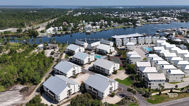 bird's eye view with a water view and a residential view