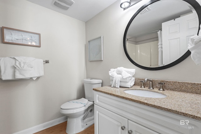 full bathroom featuring visible vents, baseboards, toilet, vanity, and wood finished floors