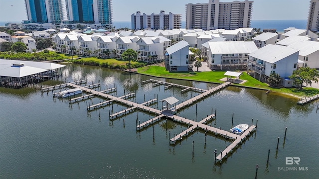 exterior space with boat lift, central AC unit, and a water view