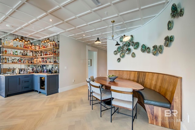 27269 Perdido Beach Blvd Unit C5A, Orange Beach, AL 36561 - dining space featuring bar, baseboards, and recessed lighting