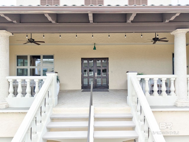 27269 Perdido Beach Blvd Unit C5A, Orange Beach, AL 36561 - property entrance featuring a ceiling fan, french doors, and stucco siding