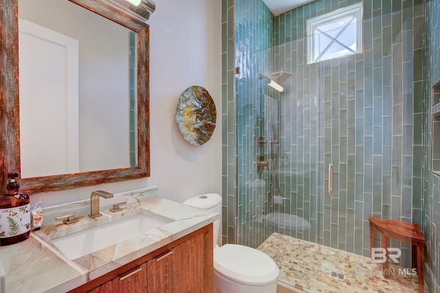 27269 Perdido Beach Blvd Unit C5A, Orange Beach, AL 36561 - bathroom with tiled shower, toilet, and vanity