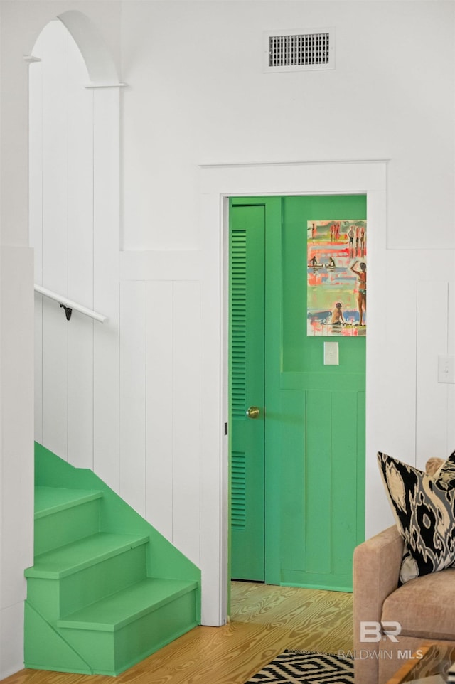 interior space featuring wood finished floors and visible vents