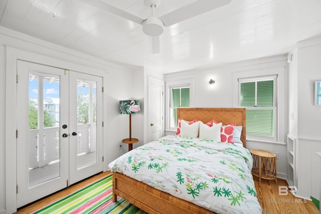 bedroom featuring light wood-style flooring, french doors, access to exterior, and ceiling fan