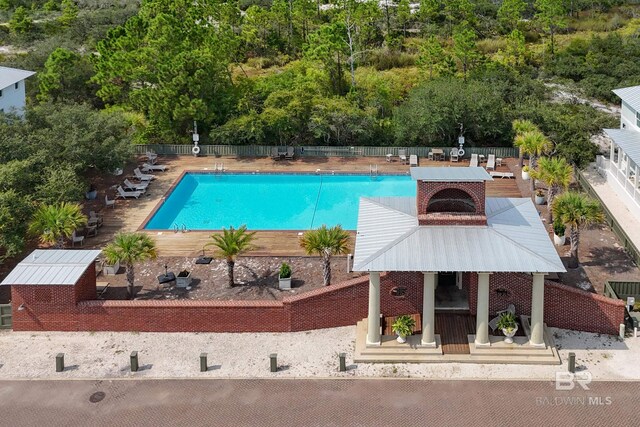 pool with a fenced backyard