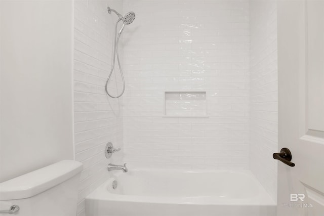 full bathroom with toilet and bathtub / shower combination