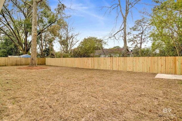 view of yard with fence