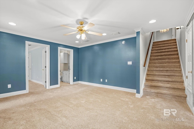 interior space featuring light colored carpet, ceiling fan, and ornamental molding