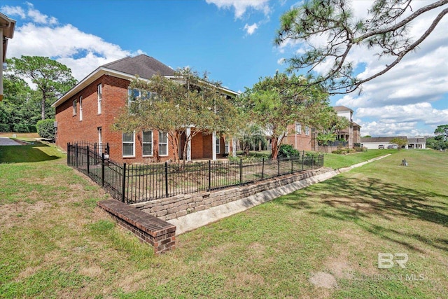 exterior space featuring a front yard