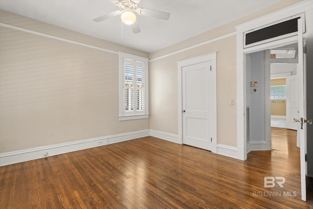 24 Macy Pl, Mobile, AL 36604 - unfurnished bedroom featuring wood finished floors, baseboards, and a ceiling fan