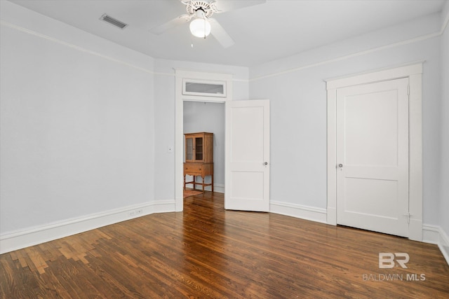 24 Macy Pl, Mobile, AL 36604 - unfurnished bedroom featuring wood finished floors, baseboards, and a ceiling fan