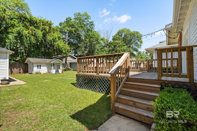 24 Macy Pl, Mobile, AL 36604 - view of grassy yard with a wooden deck and an outbuilding