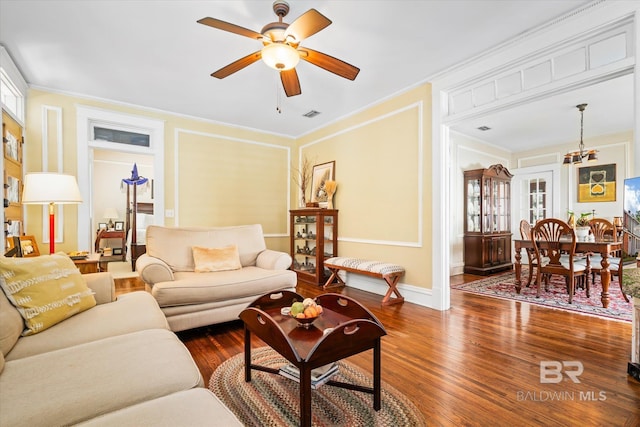 24 Macy Pl, Mobile, AL 36604 - living room with a ceiling fan, crown molding, dark wood-type flooring, and baseboards
