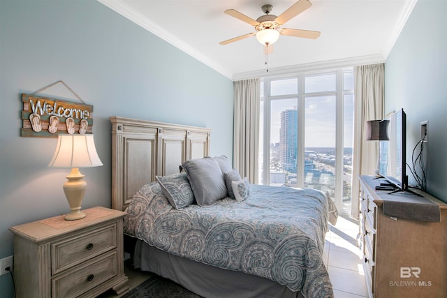 tiled bedroom with a wall of windows, crown molding, and ceiling fan