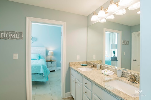 bathroom with tile patterned flooring and vanity