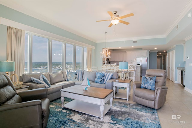 living room featuring light tile patterned flooring, ceiling fan with notable chandelier, and crown molding