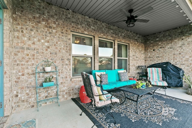 view of patio with grilling area, an outdoor hangout area, and ceiling fan