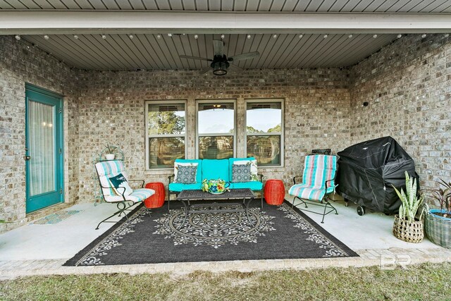 view of patio featuring outdoor lounge area, a grill, and ceiling fan