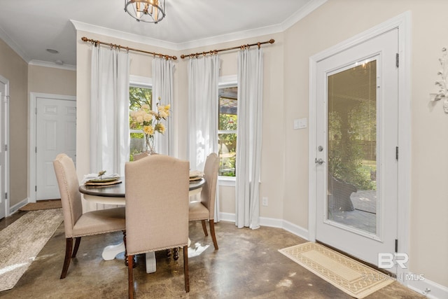 4331 Hamilton Oaks Ln, Mobile, AL 36695 - dining room featuring concrete flooring, crown molding, and baseboards