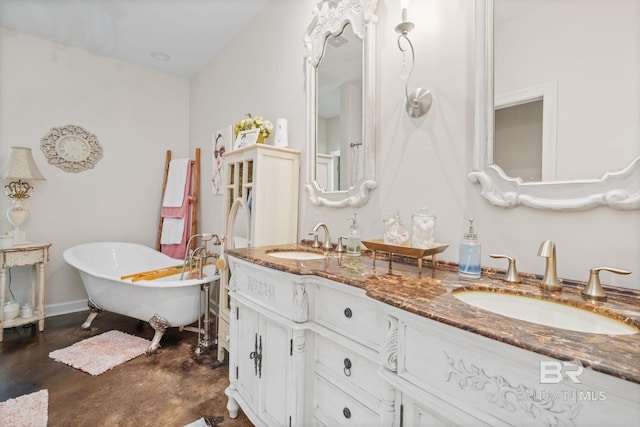 4331 Hamilton Oaks Ln, Mobile, AL 36695 - bathroom featuring a soaking tub, double vanity, and concrete floors