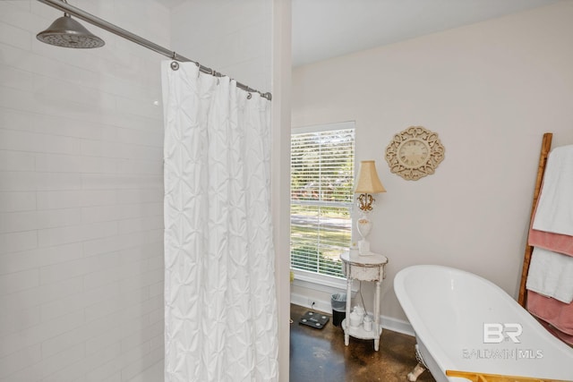4331 Hamilton Oaks Ln, Mobile, AL 36695 - full bath featuring a freestanding tub, a tile shower, and finished concrete flooring