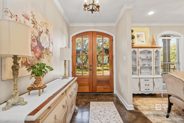 4331 Hamilton Oaks Ln, Mobile, AL 36695 - foyer featuring finished concrete floors, a chandelier, french doors, baseboards, and crown molding