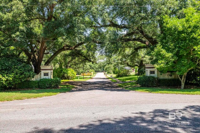 4331 Hamilton Oaks Ln, Mobile, AL 36695 - view of asphalt street with view of scattered trees