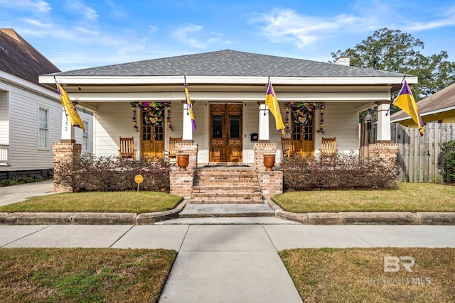 view of front of home featuring covered porch