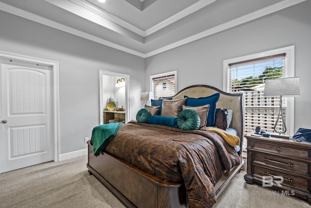 bedroom with crown molding, a raised ceiling, and light colored carpet