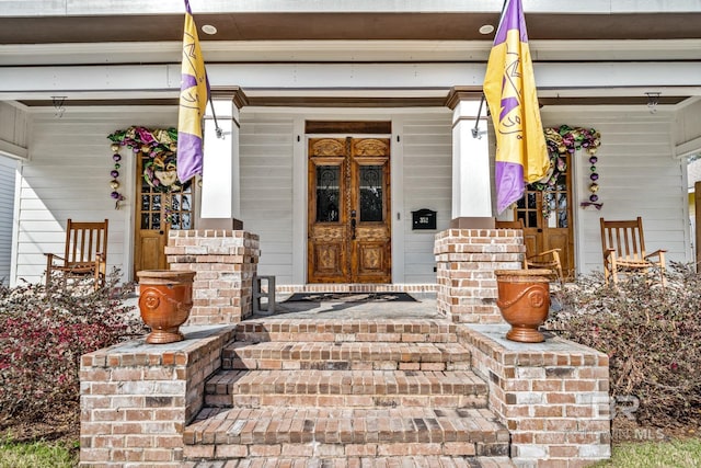 property entrance with a porch