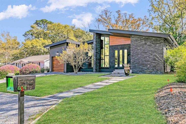604 Johnson Ave, Fairhope, AL 36532 - contemporary home with a front yard and a garage