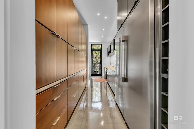 hallway featuring sink