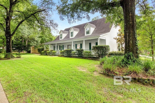 6505 Charing Wood Dr, Mobile, AL 36695 - cape cod house featuring a porch, a front yard, and roof with shingles