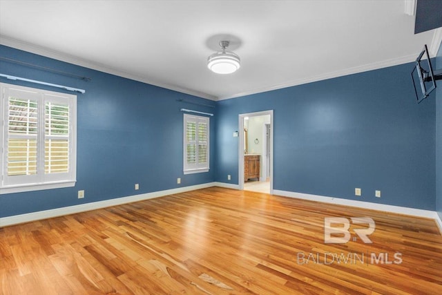 6505 Charing Wood Dr, Mobile, AL 36695 - unfurnished room featuring plenty of natural light, wood finished floors, and crown molding