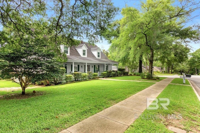 6505 Charing Wood Dr, Mobile, AL 36695 - cape cod-style house with covered porch and a front yard