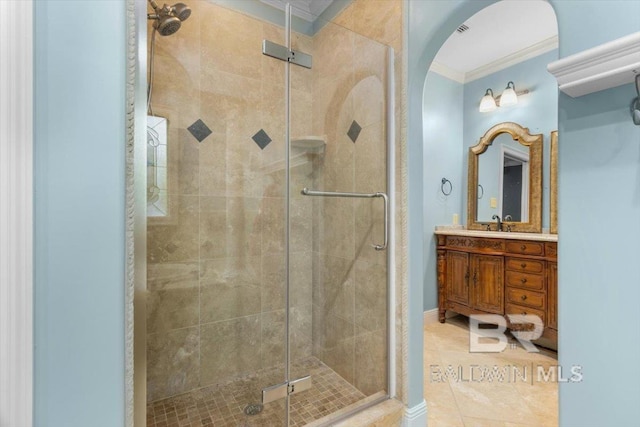 6505 Charing Wood Dr, Mobile, AL 36695 - full bathroom featuring crown molding, vanity, a stall shower, and tile patterned flooring