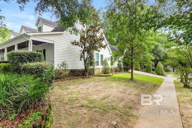6505 Charing Wood Dr, Mobile, AL 36695 - view of property exterior featuring a shingled roof