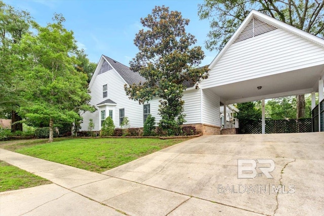 6505 Charing Wood Dr, Mobile, AL 36695 - view of front facade with a front lawn, driveway, and an attached carport