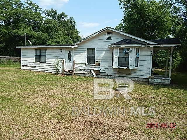 2647 Banks Ave, Mobile, AL 36617 - rear view of house with a yard