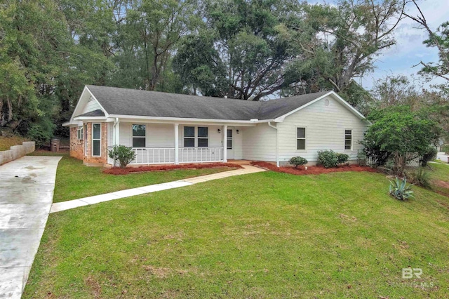 ranch-style home with a front yard and a porch