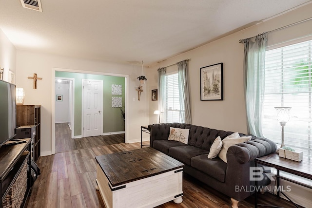 2920 Quail Creek Run, Mobile, AL 36695 - living area featuring dark wood-style floors and baseboards