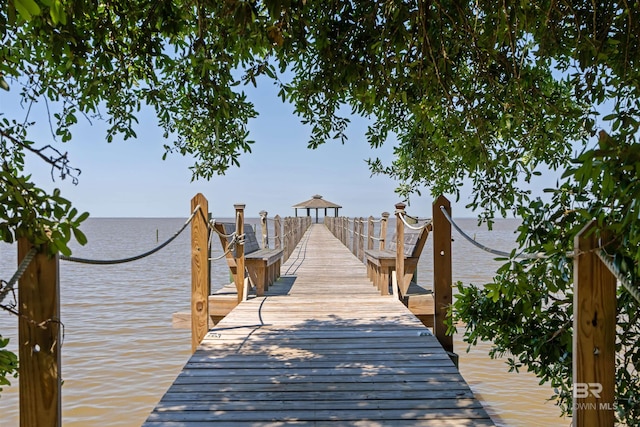 view of dock with a water view