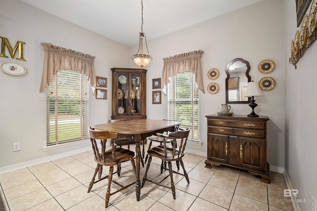 dining room featuring light tile patterned floors