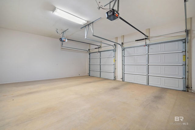 garage featuring a garage door opener