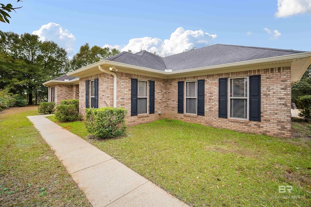 exterior space featuring a front lawn