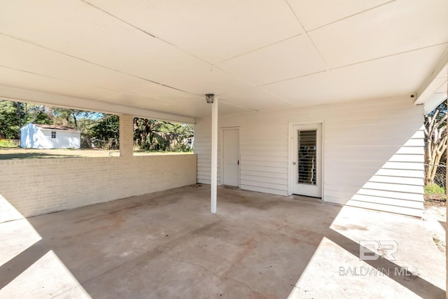 view of patio featuring an attached carport