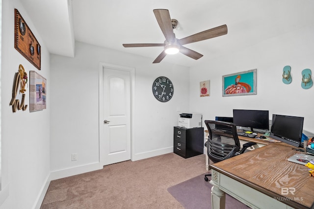 office space with ceiling fan and carpet floors